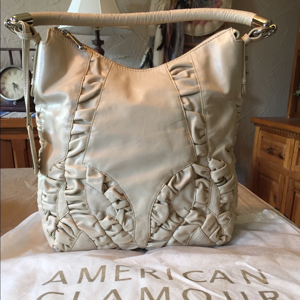 Beautiful leather handbag by Badgley Mischka